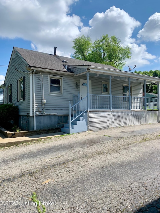 4727 Cliff Ave, Louisville, KY 40215 - view of front of property featuring covered porch and a shingled roof