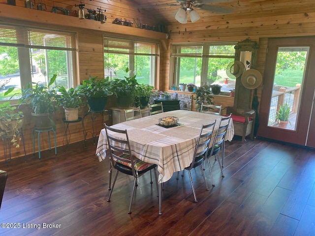 1222 Mountain View Rd, Falls Of Rough, KY 40119 - dining space with a ceiling fan, wooden walls, dark wood-type flooring, and lofted ceiling