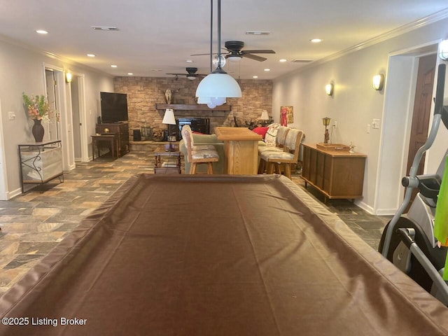 1222 Mountain View Rd, Falls Of Rough, KY 40119 - playroom featuring ceiling fan, crown molding, recessed lighting, a fireplace, and baseboards
