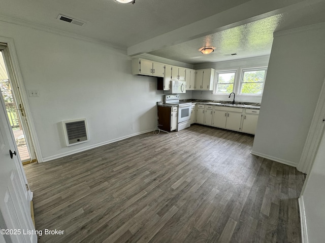 76 Bethel Church Rd, Brandenburg, KY 40108 - kitchen featuring white appliances, a sink, dark wood-type flooring, white cabinets, and baseboards