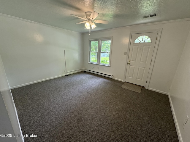 76 Bethel Church Rd, Brandenburg, KY 40108 - entryway with a baseboard radiator, crown molding, ceiling fan, a textured ceiling, and dark colored carpet