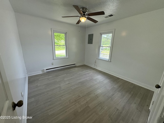 76 Bethel Church Rd, Brandenburg, KY 40108 - empty room featuring a baseboard radiator, wood finished floors, ceiling fan, baseboards, and a textured ceiling