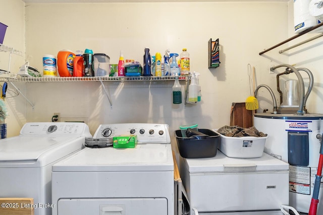8887 New Haven Rd, New Haven, KY 40051 - clothes washing area featuring separate washer and dryer and electric water heater