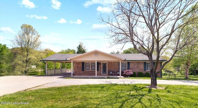 8887 New Haven Rd, New Haven, KY 40051 - ranch-style house with driveway, a front lawn, an attached carport, and brick siding