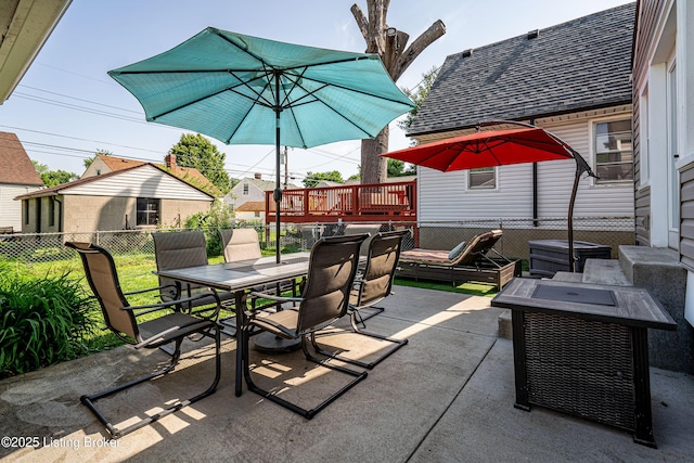 607 Penguin St, Louisville, KY 40217 - view of patio with outdoor dining space, fence, and a deck