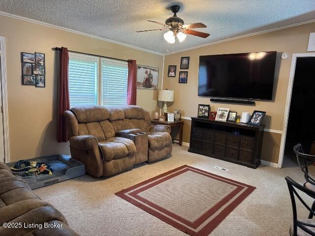 139 Mountain View Estates Rd, Elizabethtown, KY 42701 - carpeted living area with ceiling fan, ornamental molding, and a textured ceiling