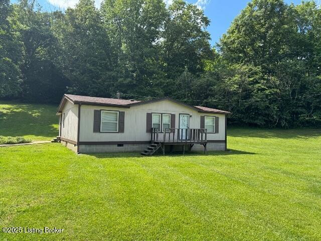 139 Mountain View Estates Rd, Elizabethtown, KY 42701 - view of front facade featuring crawl space, a front yard, and a wooden deck