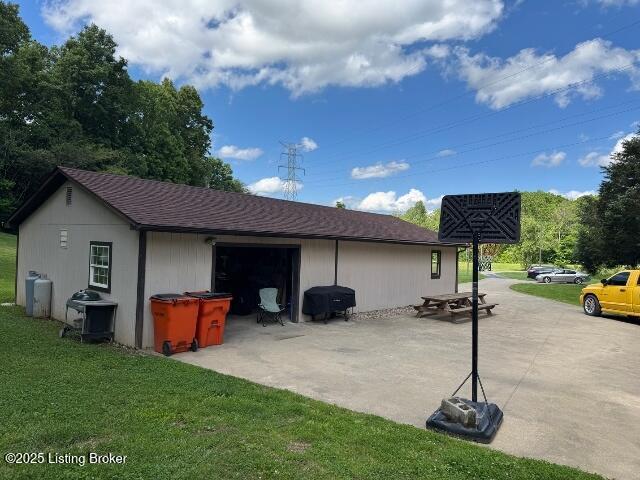 139 Mountain View Estates Rd, Elizabethtown, KY 42701 - view of home's exterior featuring a yard, a patio area, and a shingled roof