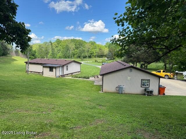 139 Mountain View Estates Rd, Elizabethtown, KY 42701 - view of property exterior featuring a lawn