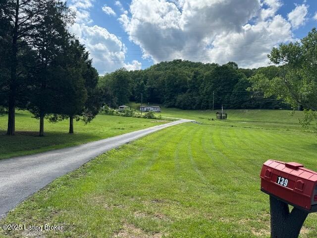 139 Mountain View Estates Rd, Elizabethtown, KY 42701 - view of community featuring a view of trees and a yard