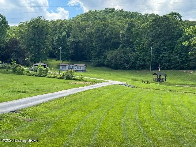 139 Mountain View Estates Rd, Elizabethtown, KY 42701 - view of community featuring a forest view and a yard