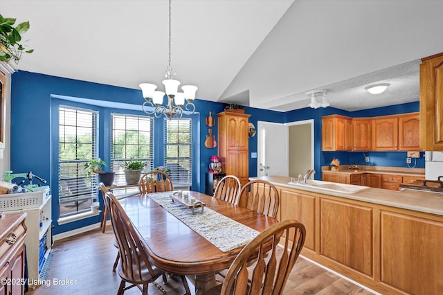 1401 Brooks Hill Rd, Brooks, KY 40109 - dining area with a chandelier, vaulted ceiling, and light wood finished floors