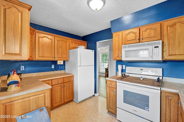 1401 Brooks Hill Rd, Brooks, KY 40109 - kitchen with white appliances, light countertops, a textured ceiling, brown cabinetry, and light flooring