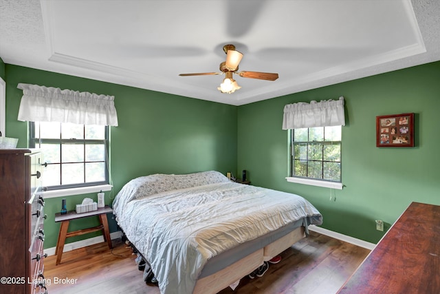 1401 Brooks Hill Rd, Brooks, KY 40109 - bedroom featuring wood finished floors, a raised ceiling, baseboards, and a ceiling fan