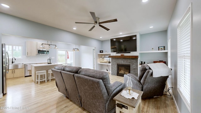 30 Bell Ct, Bedford, KY 40006 - living area featuring ceiling fan, light wood-type flooring, a fireplace, and recessed lighting