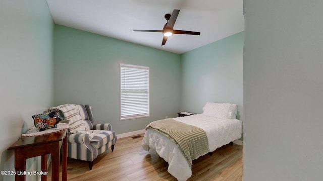 30 Bell Ct, Bedford, KY 40006 - bedroom with wood finished floors, baseboards, and ceiling fan