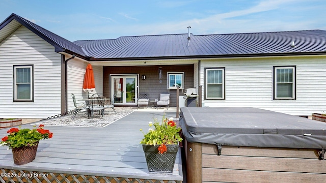 30 Bell Ct, Bedford, KY 40006 - wooden deck with a hot tub and outdoor dining space