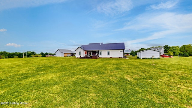 30 Bell Ct, Bedford, KY 40006 - back of house featuring a yard and a wooden deck