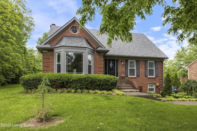 700 Sentry Way, Louisville, KY 40223 - view of front facade featuring a chimney, roof with shingles, brick siding, and a front yard