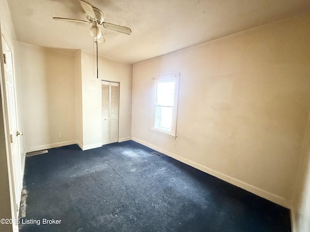 1428 Shingo Ave, Louisville, KY 40215 - unfurnished bedroom featuring a closet, baseboards, and a ceiling fan