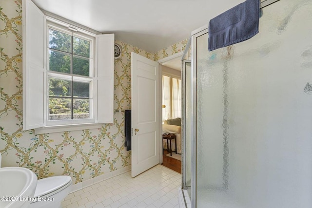 1802 Park Boundary Rd, Louisville, KY 40205 - full bath with wallpapered walls, a shower stall, tile patterned floors, baseboards, and toilet