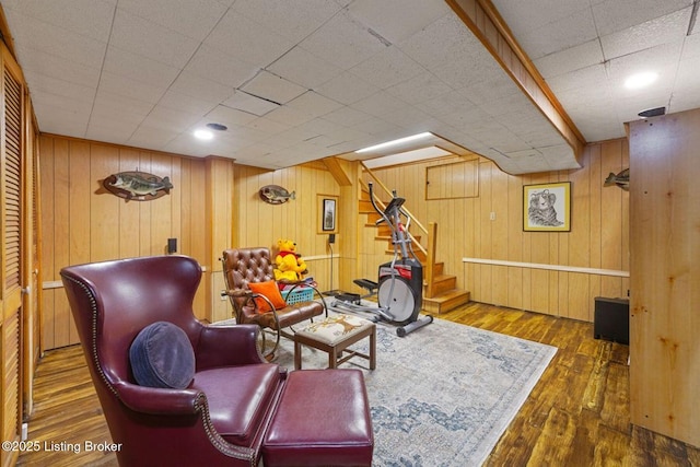 1802 Park Boundary Rd, Louisville, KY 40205 - living area featuring stairs, hardwood / wood-style floors, and wooden walls