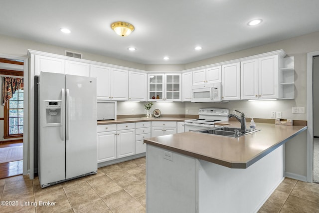 2434 Eastwood Cir, Crestwood, KY 40014 - kitchen featuring white appliances, a sink, a peninsula, white cabinetry, and recessed lighting
