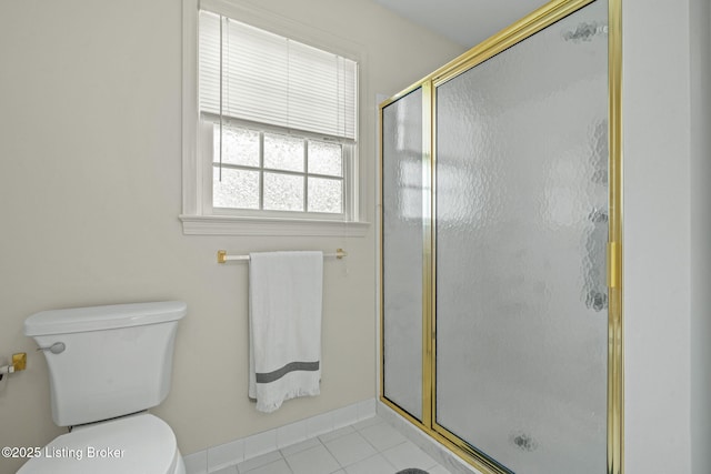 2434 Eastwood Cir, Crestwood, KY 40014 - bathroom featuring a shower stall, tile patterned flooring, toilet, and baseboards