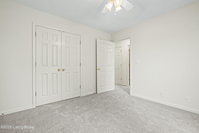2434 Eastwood Cir, Crestwood, KY 40014 - unfurnished bedroom featuring carpet, a closet, baseboards, and a ceiling fan