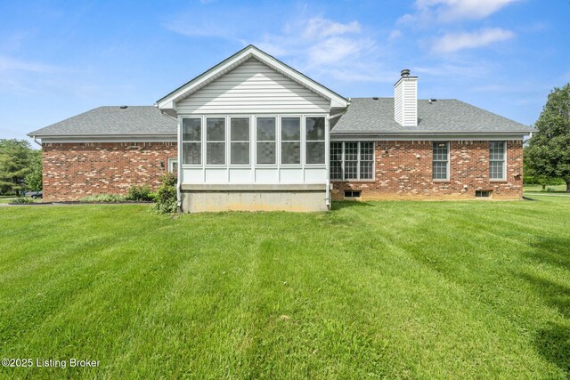 2434 Eastwood Cir, Crestwood, KY 40014 - rear view of house with brick siding, a sunroom, a yard, a chimney, and a shingled roof