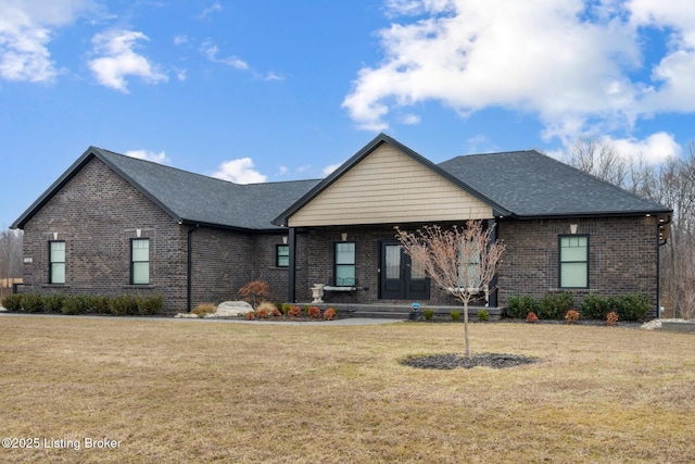 190 Foxwood Ct, Elizabethtown, KY 42701 - view of front facade with brick siding, a front lawn, covered porch, and roof with shingles