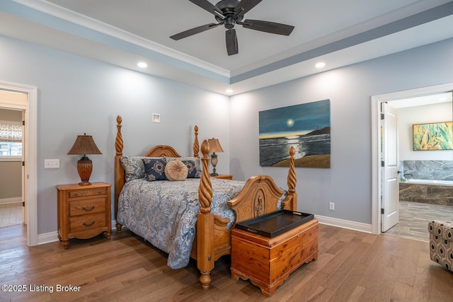 190 Foxwood Ct, Elizabethtown, KY 42701 - bedroom with wood finished floors, recessed lighting, baseboards, connected bathroom, and a ceiling fan