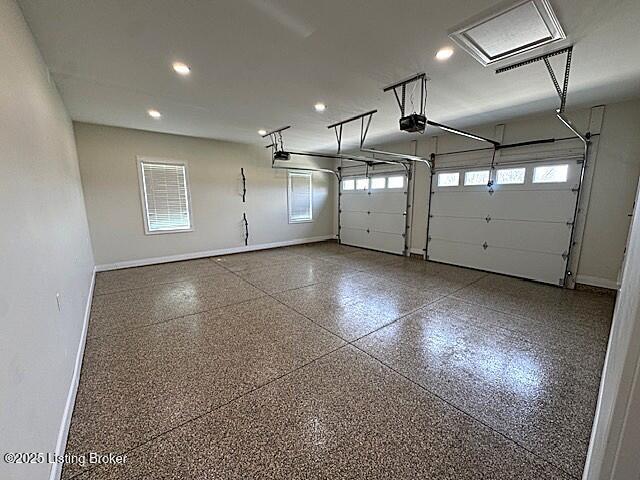 190 Foxwood Ct, Elizabethtown, KY 42701 - garage with a garage door opener, baseboards, and recessed lighting