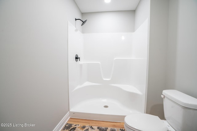 190 Foxwood Ct, Elizabethtown, KY 42701 - bathroom featuring wood finished floors, toilet, and a shower