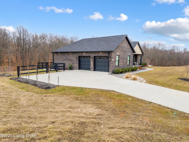190 Foxwood Ct, Elizabethtown, KY 42701 - view of property exterior with brick siding, a garage, a yard, concrete driveway, and roof with shingles