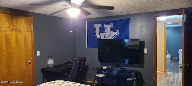 7 Dylan Ln, Upton, KY 42784 - bedroom with wood finished floors, a ceiling fan, and a textured ceiling