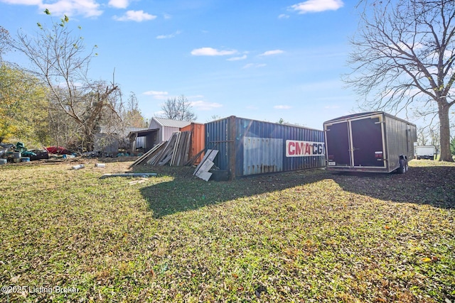264A Saint Catherine St, New Haven, KY 40051 - view of green lawn featuring a storage shed and an outbuilding