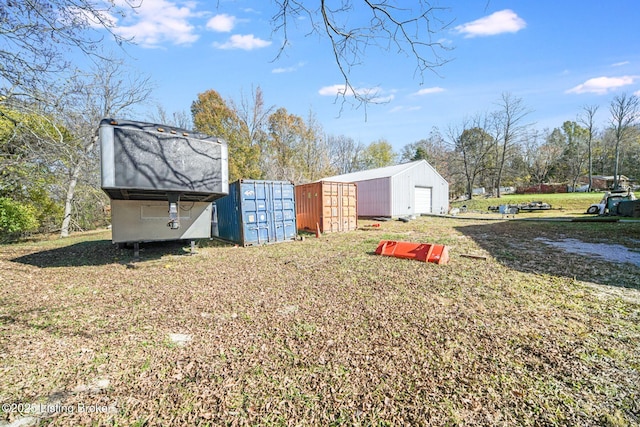 264A Saint Catherine St, New Haven, KY 40051 - view of yard with a detached garage and mail area
