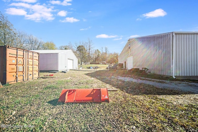 264A Saint Catherine St, New Haven, KY 40051 - view of yard featuring a garage and an outdoor structure
