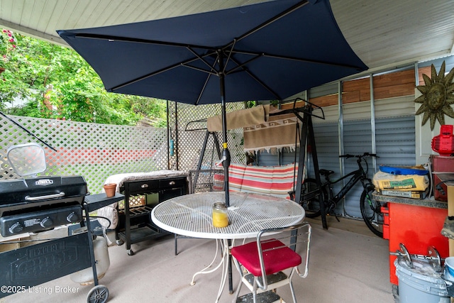 1412 Haskin Ave, Louisville, KY 40215 - view of patio / terrace featuring area for grilling, outdoor dining space, and fence