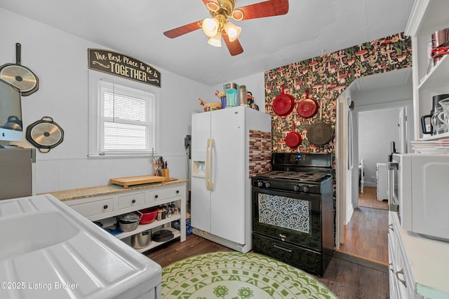 1412 Haskin Ave, Louisville, KY 40215 - kitchen with white appliances, ceiling fan, wood finished floors, light countertops, and wallpapered walls