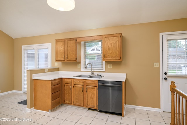 9901 Park Lake Cir, Louisville, KY 40229 - kitchen with stainless steel dishwasher, a sink, light countertops, and a peninsula