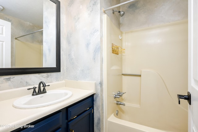 9901 Park Lake Cir, Louisville, KY 40229 - bathroom with washtub / shower combination and vanity