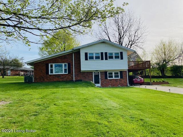606 Nally Ct, Bardstown, KY 40004 - tri-level home featuring a wooden deck, driveway, a front lawn, and a carport