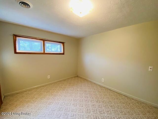 606 Nally Ct, Bardstown, KY 40004 - empty room featuring light carpet and baseboards