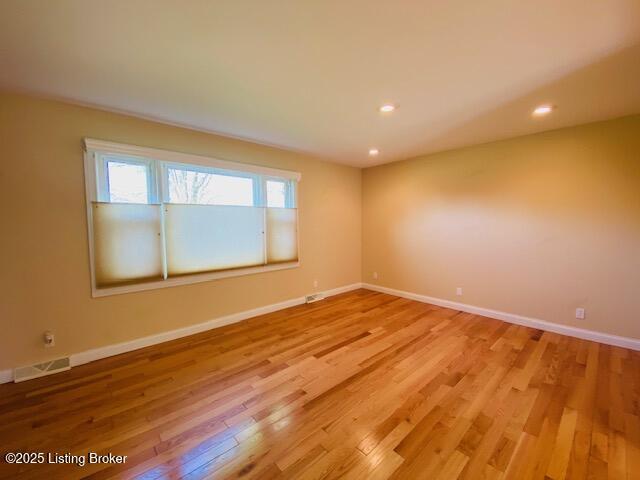 606 Nally Ct, Bardstown, KY 40004 - empty room with light wood-style flooring, baseboards, and recessed lighting