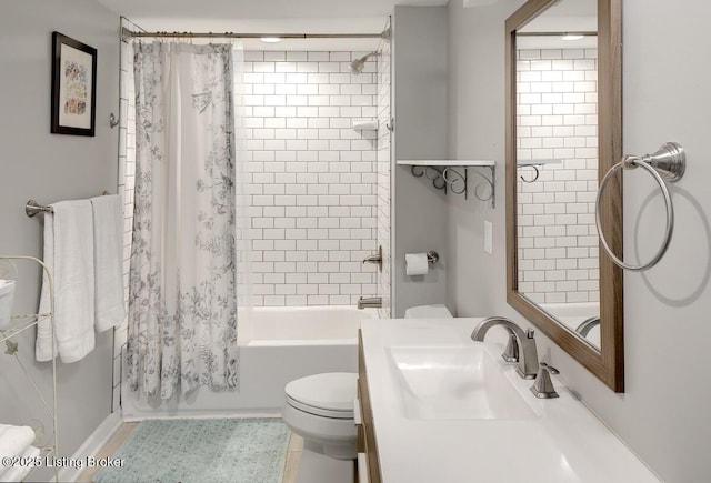 1517 Hoertz Ave, Louisville, KY 40217 - bathroom featuring a sink, toilet, and shower / tub combo