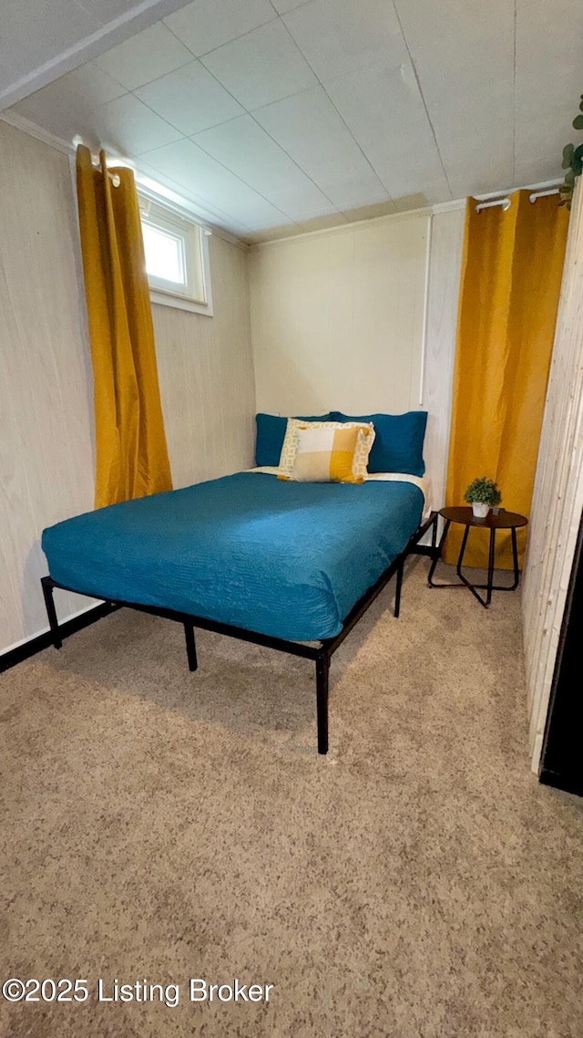 1239 Schiller Ave, Louisville, KY 40204 - carpeted bedroom featuring wood walls