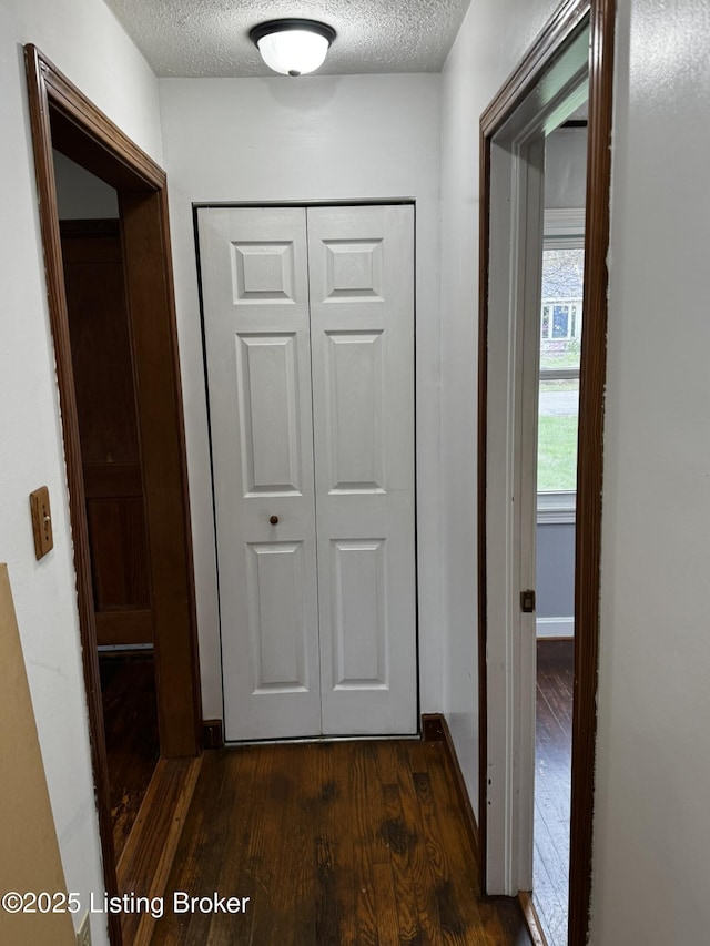 1614 Washington Blvd, Lyndon, KY 40242 - hallway featuring dark wood-style flooring and a textured ceiling