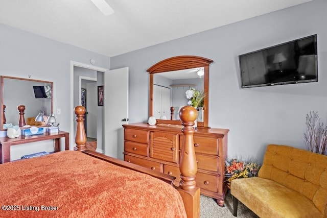bedroom with carpet flooring and a ceiling fan